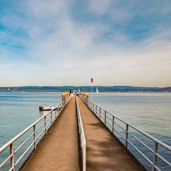 Obraz premium Beautiful spring view with reflections and a perspective view of a kay at Mainau island, Lake Bodensee, Baden-Württemberg, Germany