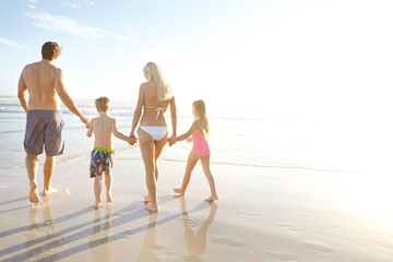 Back, holding hands and love with family on beach, walking together in summer for bonding or fun....