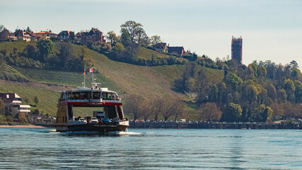 Naklejka premium Beautiful spring view with a car ferry and reflections near Meersburg, Lake Bodensee, Baden-Württemberg, Germany