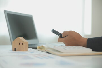 Businessmen holding pens, signing home titles with insurance, care about real estate services and...