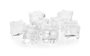 Many crystal clear ice cubes isolated on white