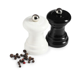 Salt and pepper shakers with grains isolated on white