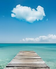 Wooden Pier Extending into Turquoise Ocean with Single Cloud