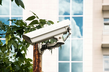 Surveillance of cctv camera installed on the metal pole closeup