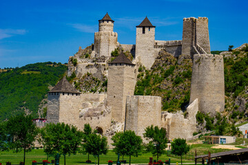 Majestic medieval Golubac fortress overlooking the Danube river in Serbia on a sunny afternoon