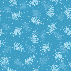Seamless blue pattern with spruce tree branches with snow.