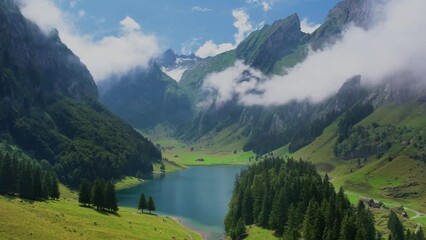 Aerial of beautiful mountain lake Seealpsee in Alps of Switzerland Sunny summer day