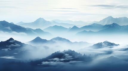 Serene mountain landscape with mist and fog creating a dreamy atmosphere.