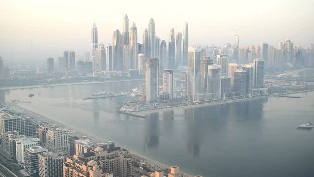 Explore a bustling cityscape as the sun rises, revealing a river flowing through its heart, showcasing the vibrant urban architecture and lively activities along the waterfront