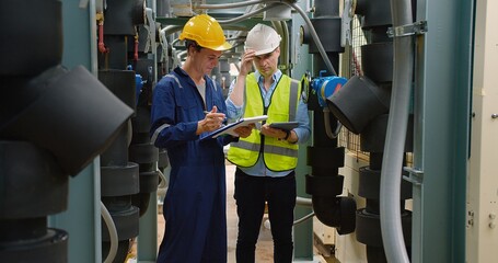 Civil engineer manager and foreman worker checking industry cooling air conditioner water cooling...
