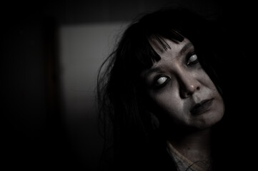 Portrait of asian woman make up ghost,Scary horror scene for background,Halloween festival...