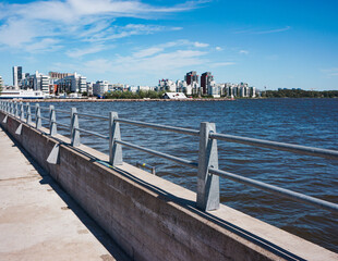 Fototapeta premium View of the sea with a city in the background
