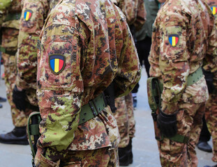 soldiers in military uniform with the national flag in three colors blue yellow and red during the...