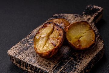 Delicious halved potatoes grilled with salt, spices and herbs