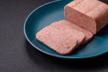 Delicious canned pink ham with salt, spices and herbs