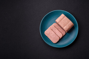 Delicious canned pink ham with salt, spices and herbs