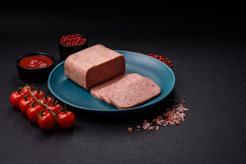 Delicious canned pink ham with salt, spices and herbs