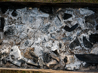 Burnt white coals for barbecue.
