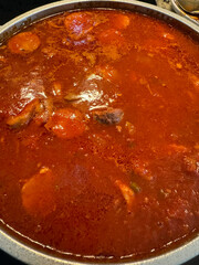 Tuco, salsa de tomate con estofado y salchicha, filetto