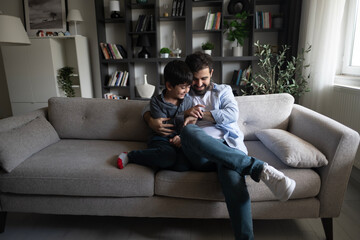 Obraz premium father and son spending time at home