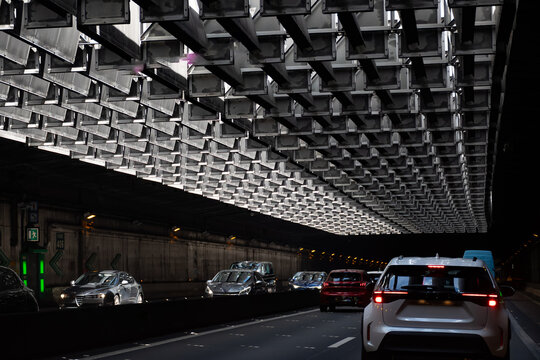 Driving in heavy traffic on ring road of capital of France, traffic jam problems in Paris