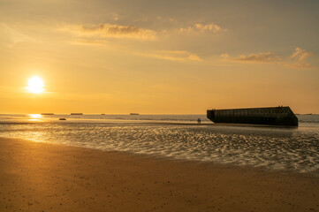Remains of the D-Day Mulberry Harbour on the Beach at Arromanches Les Bains, Normandy, France