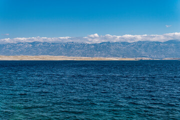 Mediterranean Sea with a Pag Island and Velebit Mountains seen behind