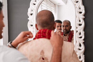 Smile, mirror and Indian man with wedding, clothes and getting ready for traditional celebration in...