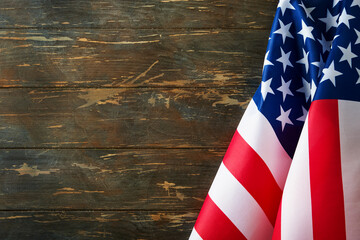 4th of July background. Empty wooden old plank table with American USA flag. National Flag Day....