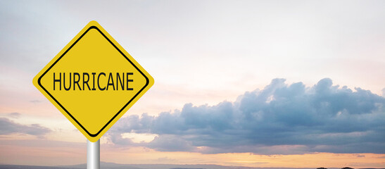 Hurricane season with symbol sign against a stormy background and copy space. dirty and angled sign adds to the drama. hurricane sign, hurricane season sing on cloudy background