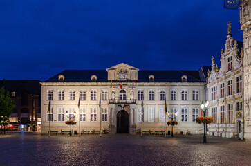 Brugse Vrije palace and Old Civil Registry Liberty of Bruges on Burg Square in Brugge old town, Bruges historical city centre, evening twilight view, West Flanders province, Flemish region, Belgium