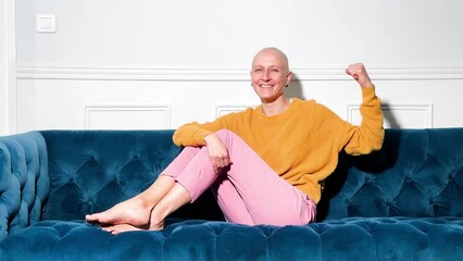 Smiling woman without hair, inspiring courage to fight cancer