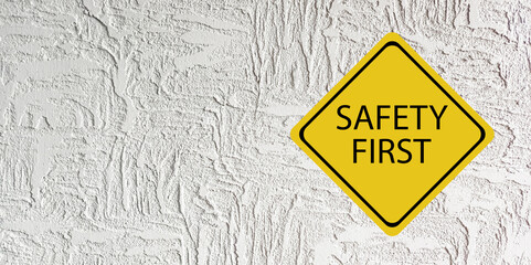 Safety first symbols, work safety, caution work hazards, danger surveillance, zero accident concept. Wooden cubes with smart grey background. Employees safety awareness at workplace. Safety banner.