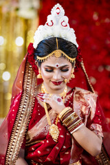 Beautiful Indian Bride in Traditional Wedding Dress with Stunning Bridal Jewelry, Exquisite Mehndi Designs, and Elegant Make-up