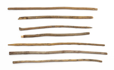 set old long wooden sticks isolated on white background