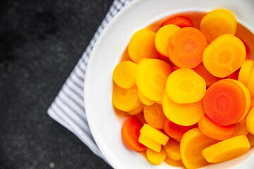 carrot salad carrot slice vegetable carrots cut rings fresh cooking meal food snack on the table copy space food background rustic top view