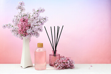 Spa and wellness composition, Fragrant rose water, lilac incense sticks and lilac flowers. salon...