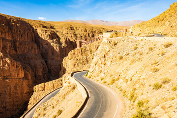 Road bends in desert mountain landscape of Dades Gorge canyon, Morocco, North Africa