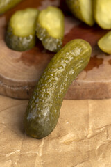 green cucumbers pickled in vinegar