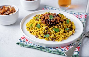 Fried onion lentil fried rice in a plate, moujadara