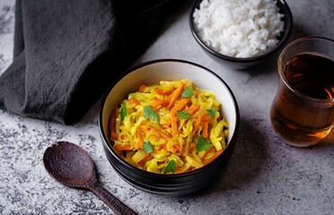 Cabbage and carrots thoran in a bowl