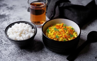 Cabbage and carrots thoran in a bowl