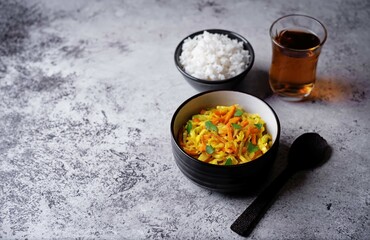 Cabbage and carrots thoran in a bowl