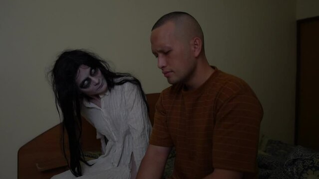 The vengeful ghost of his girlfriend follows a young man into his apartment,A ferocious female ghost stalks people.