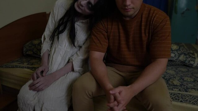 The vengeful ghost of his girlfriend follows a young man into his apartment,A ferocious female ghost stalks people.