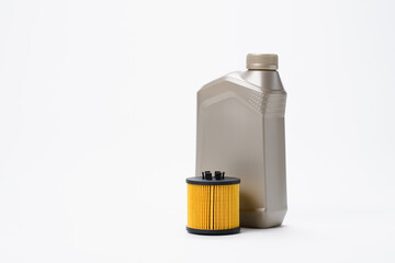 Machine oil and filter on a light background. Car service concept
