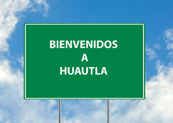 Siguiente salida Bienvenidos a huautla una señal verde sobre fondo de cielo azul. Colección de señales de tráfico conceptuales