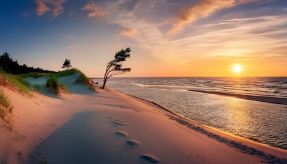 beautiful sunset on the beach of the sobieszewo island at the baltic sea poland