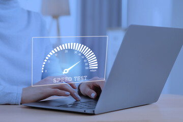 Speed test. Woman using laptop at table, closeup. Virtual screen over device