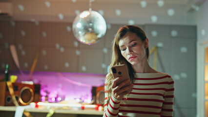 Depressed lady browsing app calling taxi after night party closeup. Lonely woman
